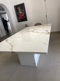 Calacatta marble dining table with Italian marble top and pedestal base