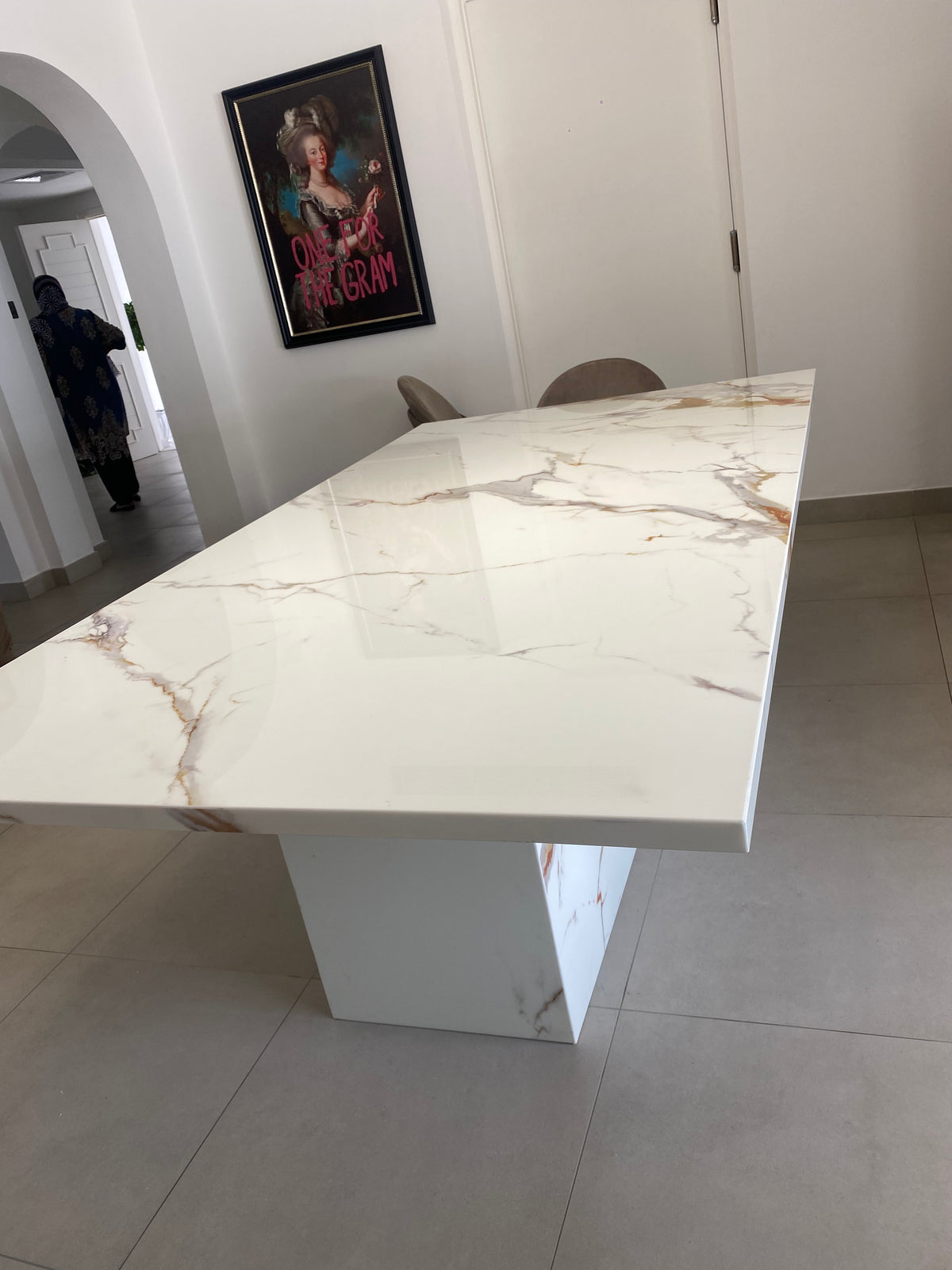 Calacatta marble dining table with Italian marble top and pedestal base
